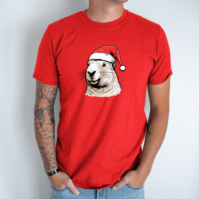Unisex marškinėliai su spauda „Capybara su kalėdine kepure“ - Image 7