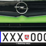 Numerių rėmelis „Girdi kaip rūdija“