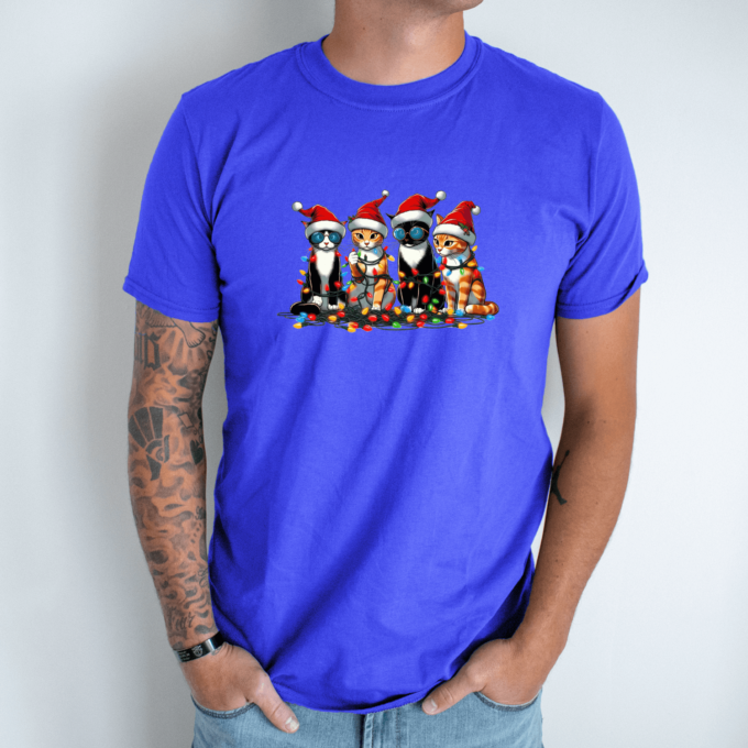 Unisex marškinėliai su spauda „Kalėdų būrys“ - Image 6
